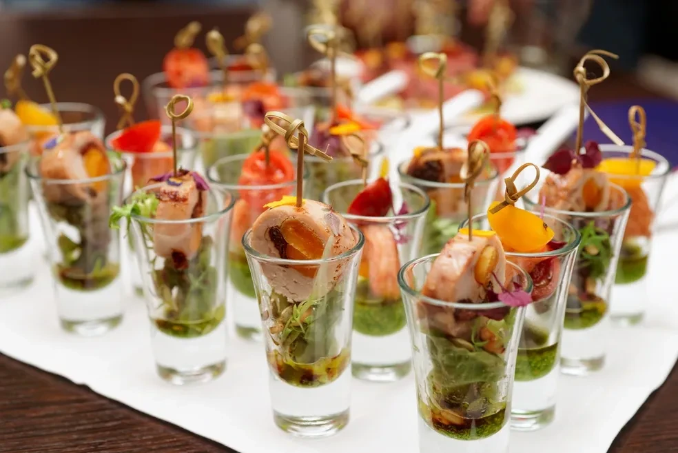 Boba shots with gold picks and fresh garnishes