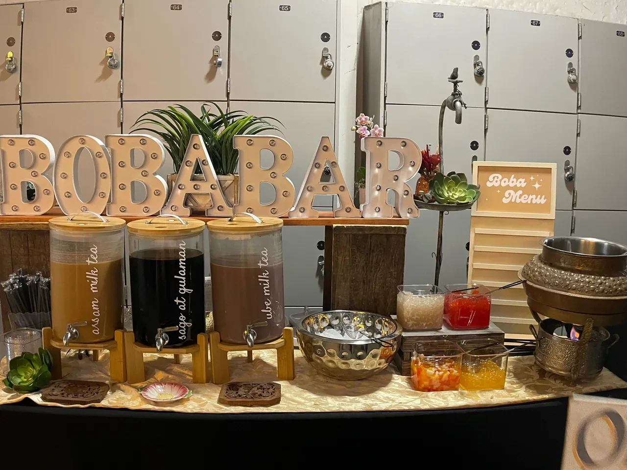Boba bar counter display with branded signage
